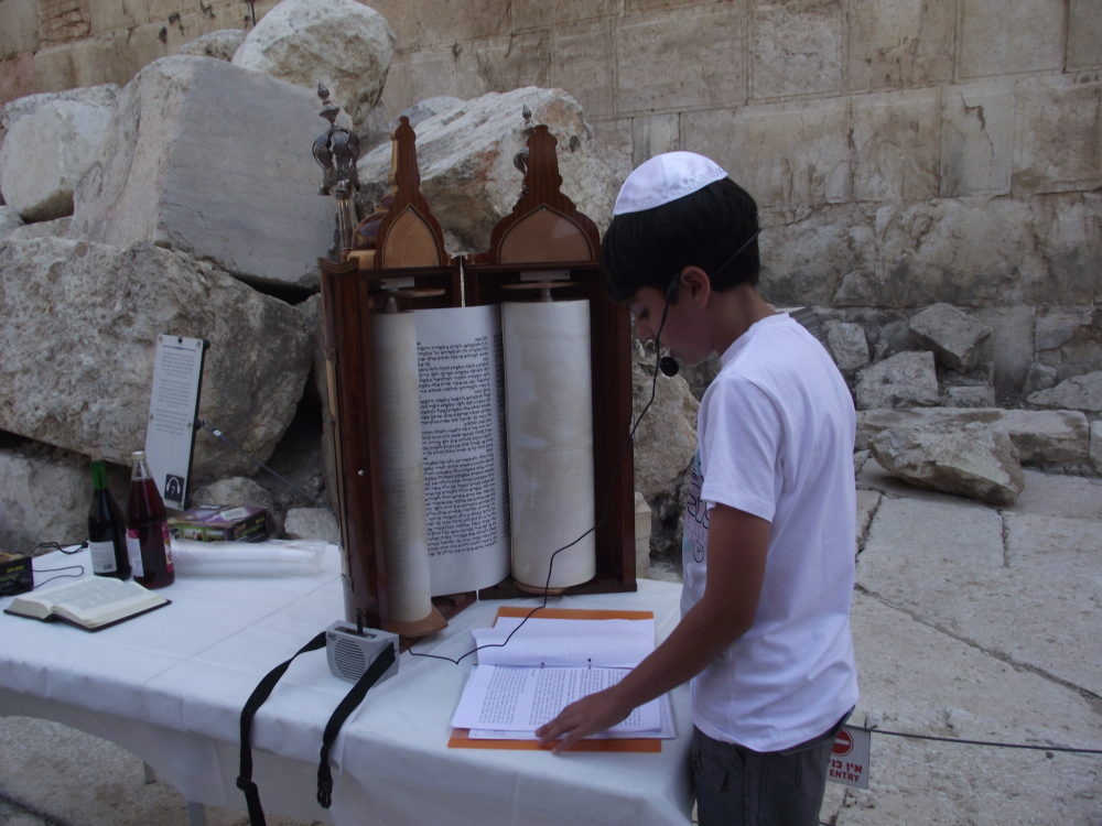 A bar mitzva boy at the wall
